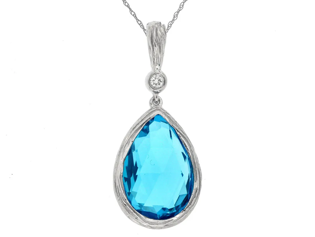 Blue Topaz and Single Diamond Pendant