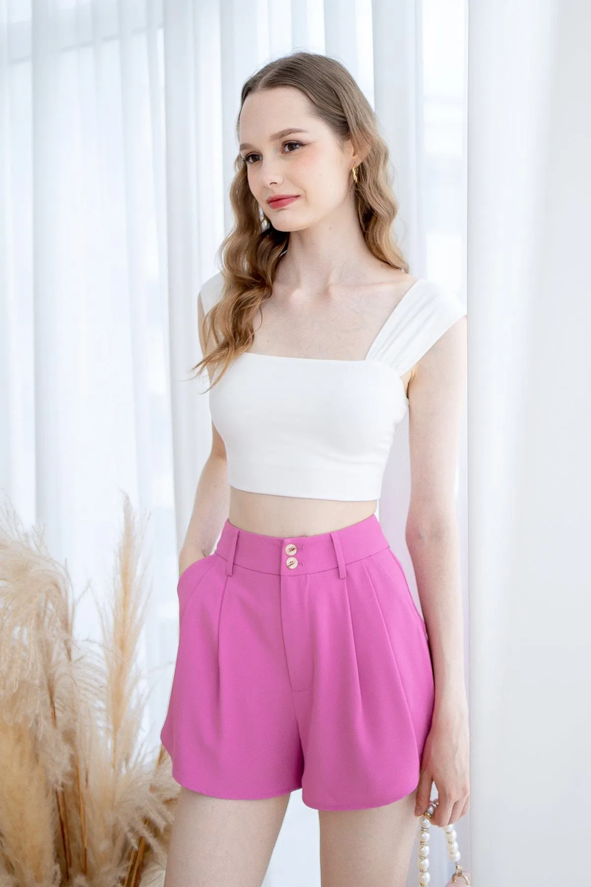 LUCCA BUTTONED PLEATED SHORTS IN BARBIE PINK