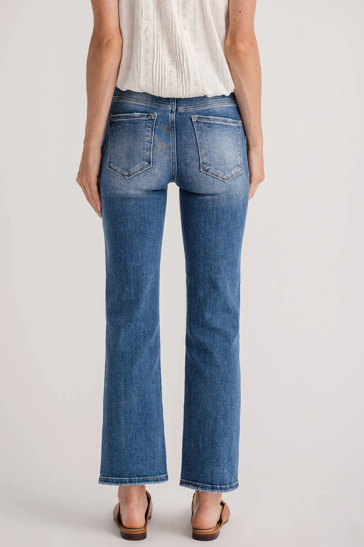 Risen High Rise Step Hem Jeans